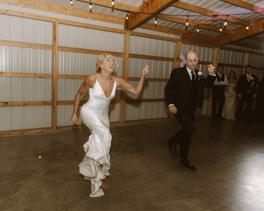 The bride and groom preforming their grand entrance dance for their guests.